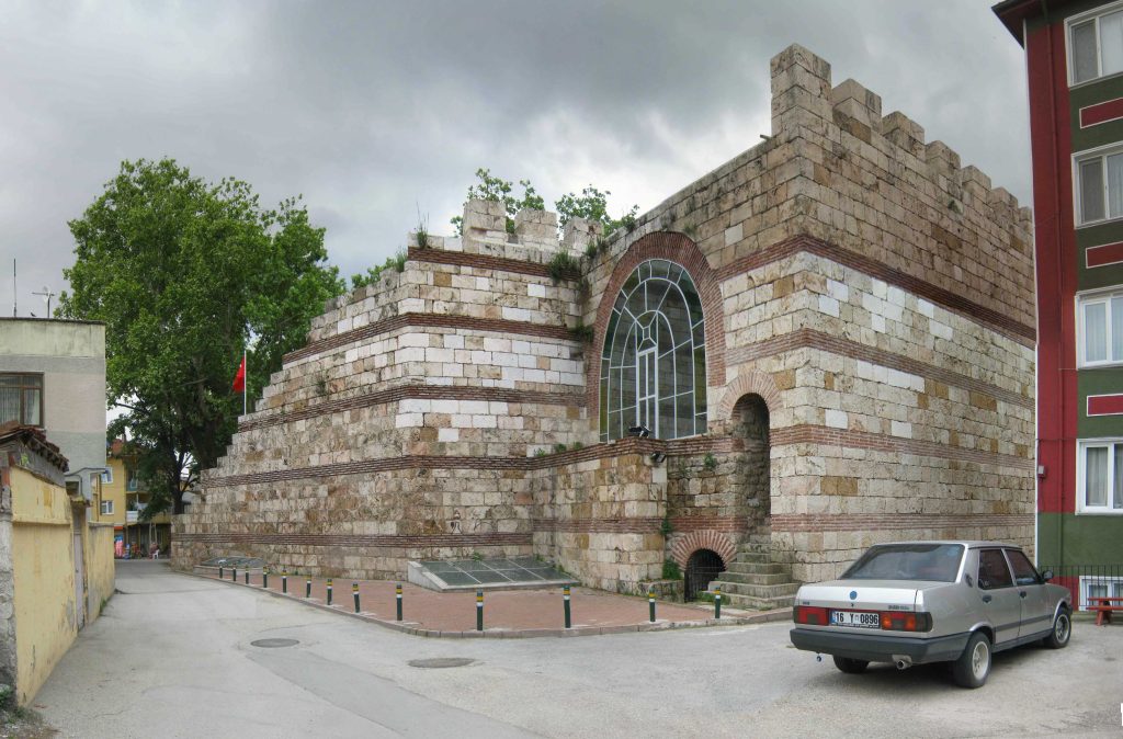 Fetih Gate of Bursa Citadel with historic stone fortifications and crenellated walls